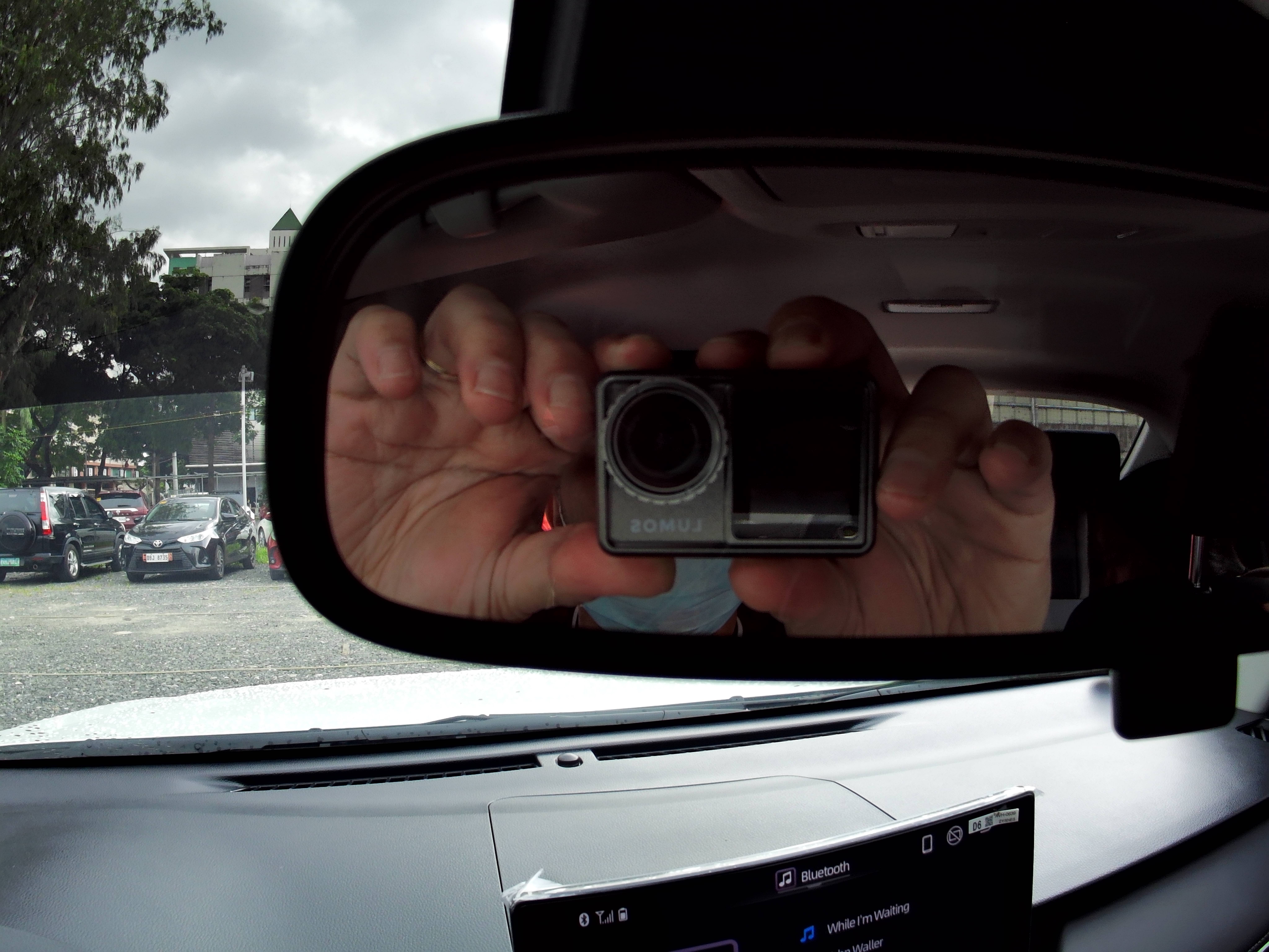 Still from inside a car during light rain